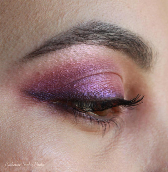 Close-up photography of purple eye make-up
