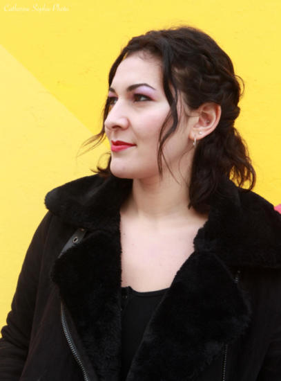 Photography of young brunette women red lips yellow background